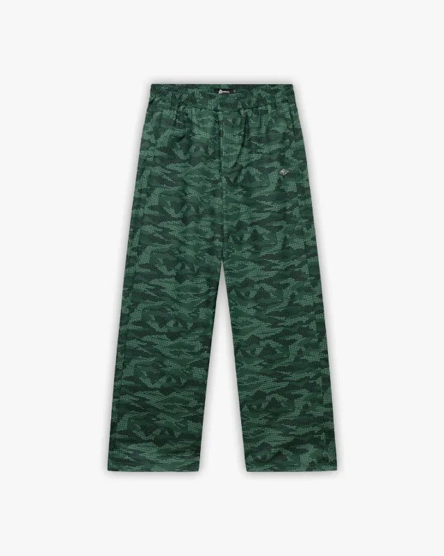 TRACK PANTS DOTTED CAMO GREEN sold by vicinity