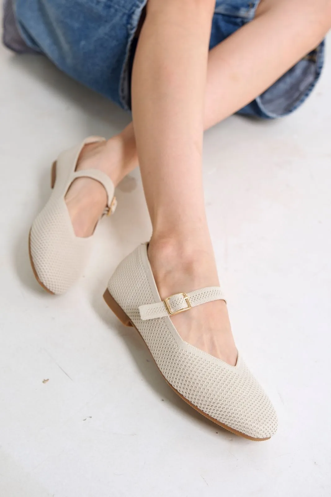 Maia Flatshoes in Cream sold by INPACA