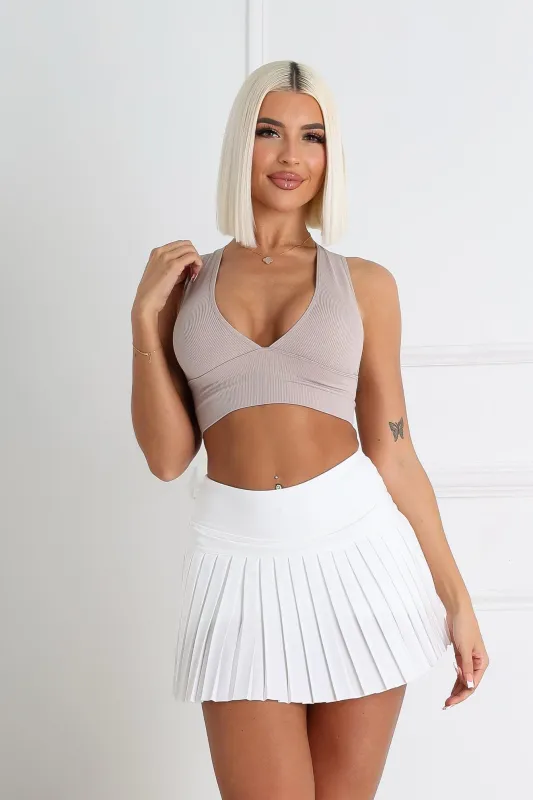 Performance Pleated Mini Tennis Skirt sold by EDGE by Know Style