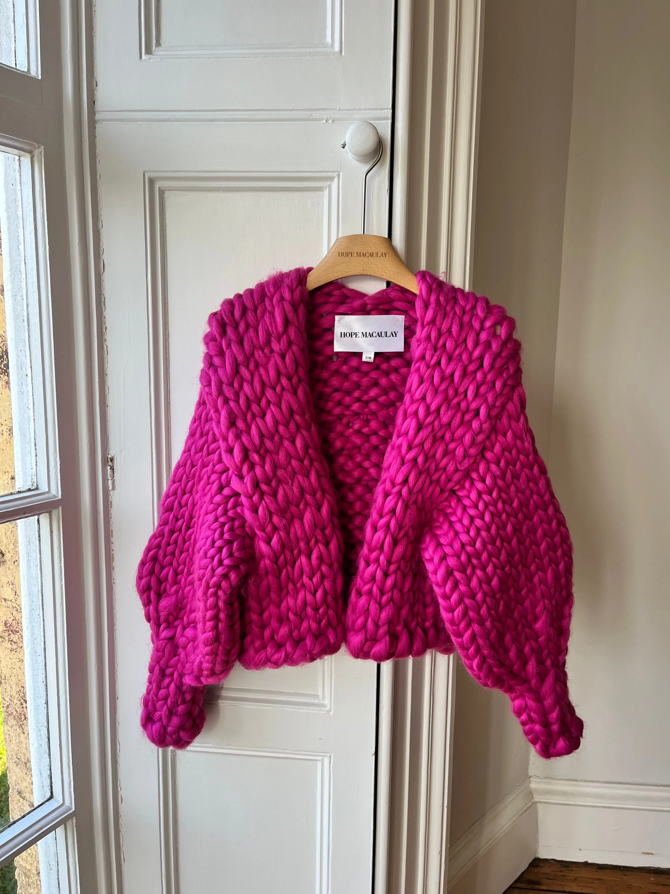 Raspberry Tie Colossal Knit Cardigan (Sample) sold by Hope Macaulay