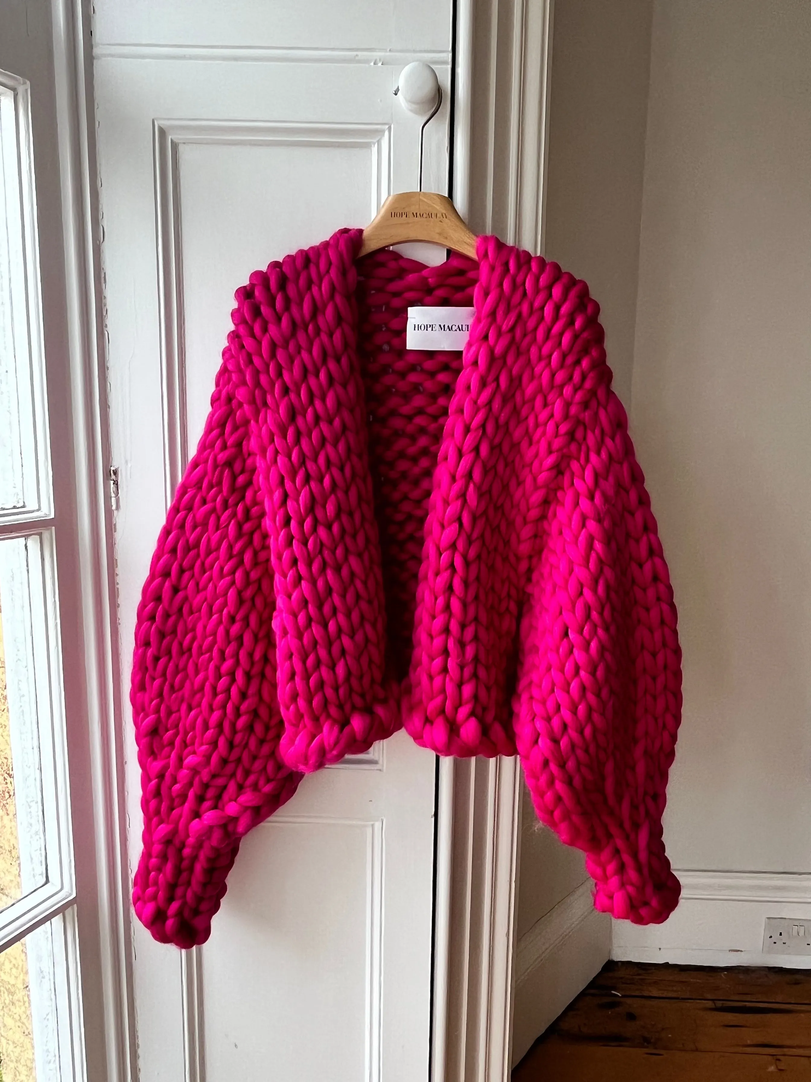 Raspberry Wool Colossal Knit Cardigan (Sample) sold by Hope Macaulay