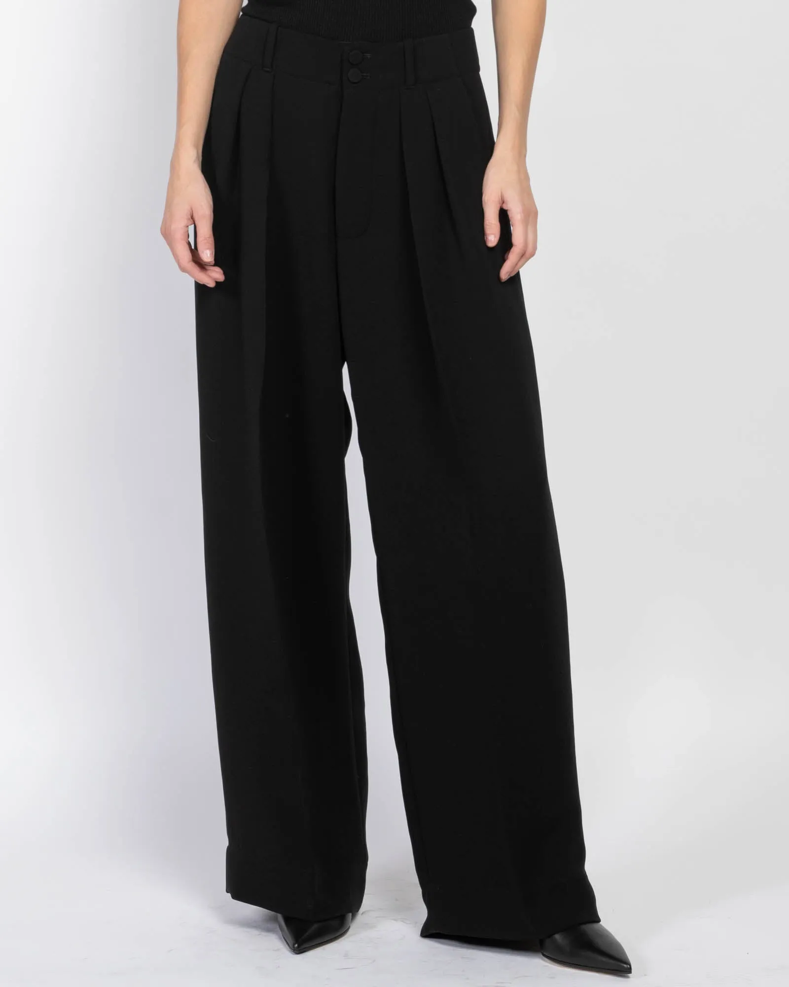 Trousers sold by TNT Fashion