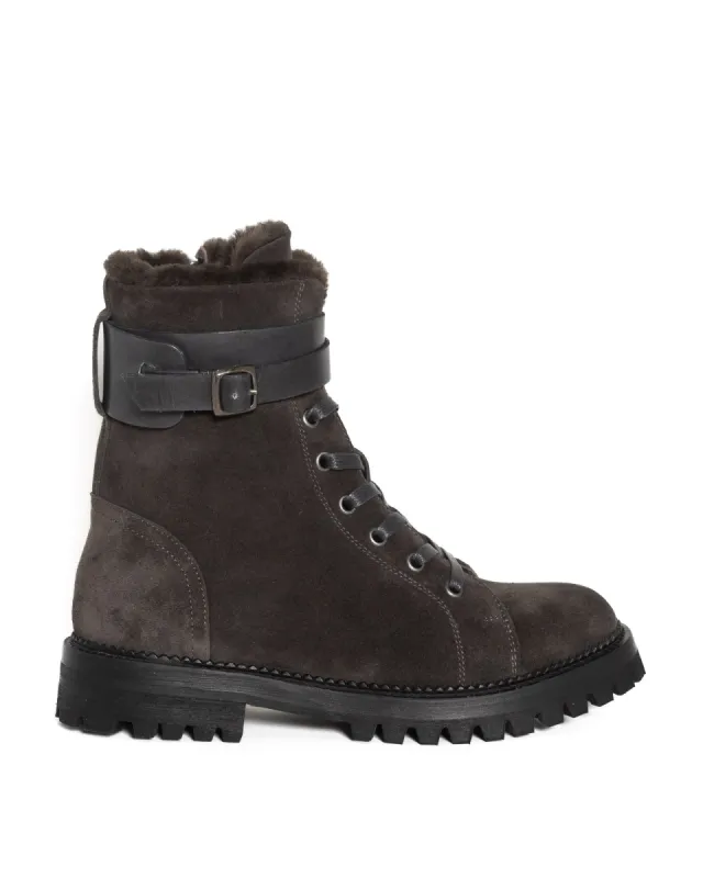 Boots sold by TNT Fashion