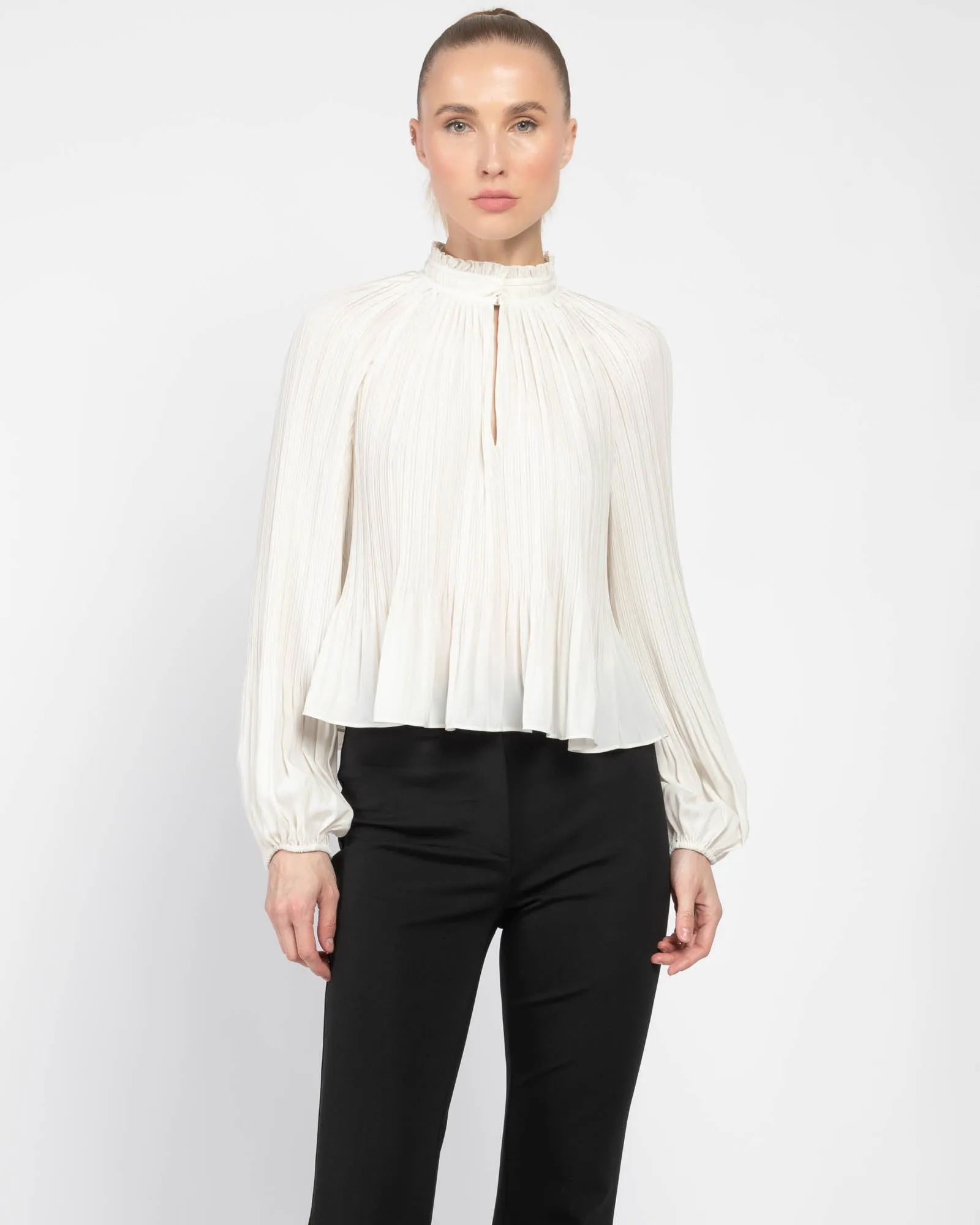 Walker Top sold by TNT Fashion