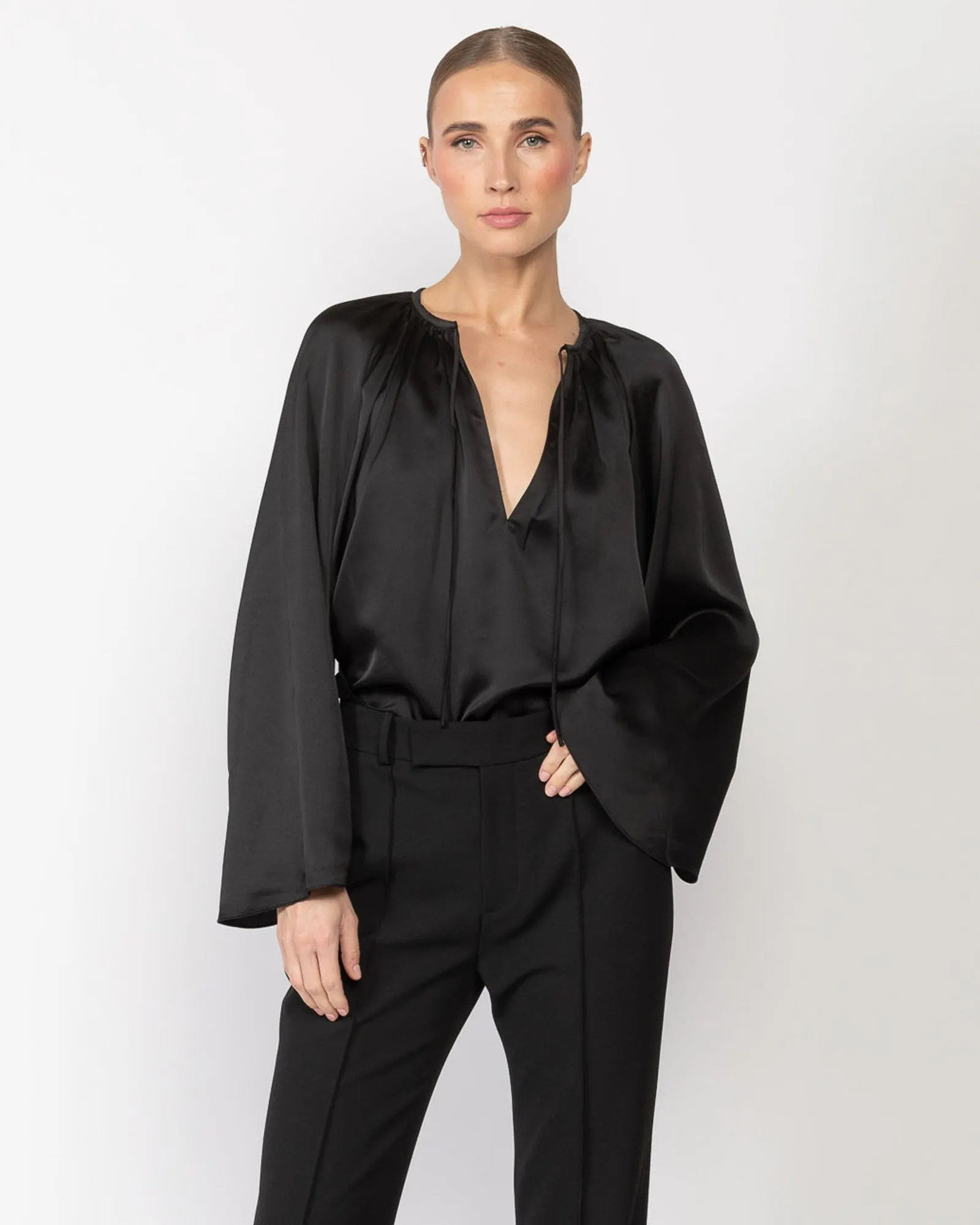 V-Neck Shirred Blouse sold by TNT Fashion