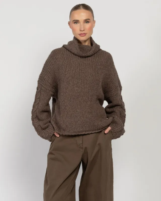 Cable Turtleneck Sweater sold by TNT Fashion