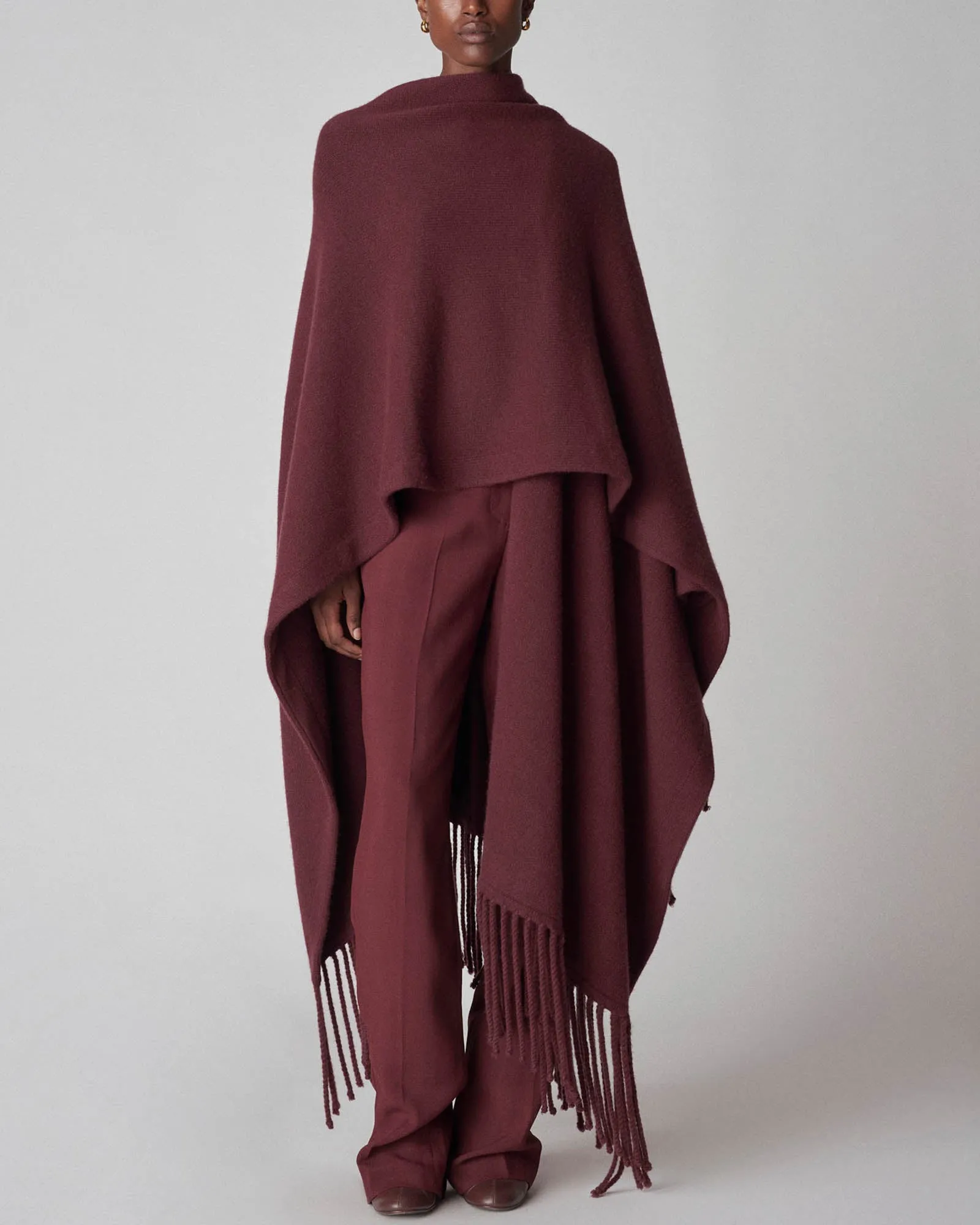Fringed Poncho sold by TNT Fashion
