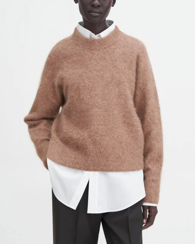 Fluffy Sweater sold by TNT Fashion