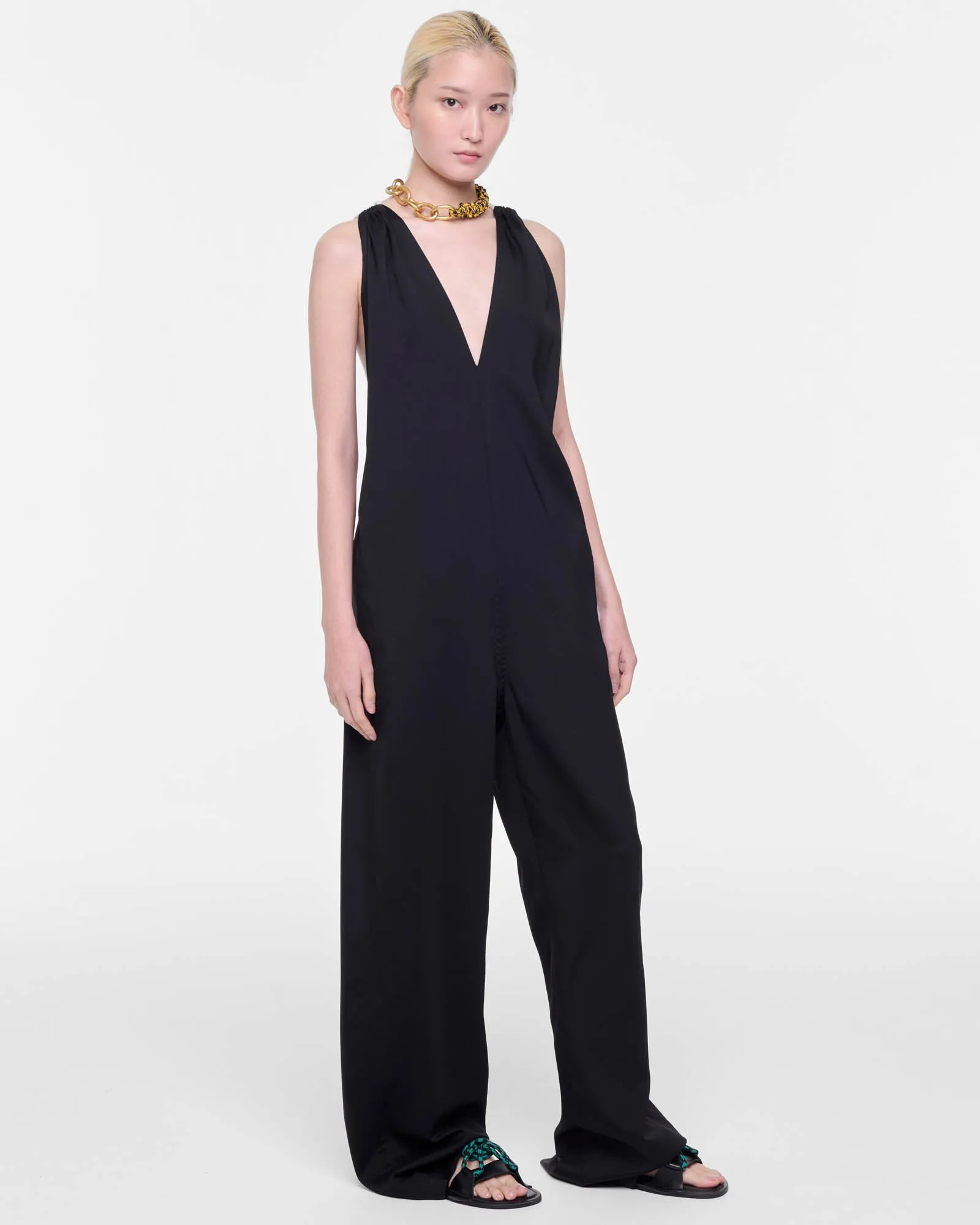 Jumpsuit sold by TNT Fashion