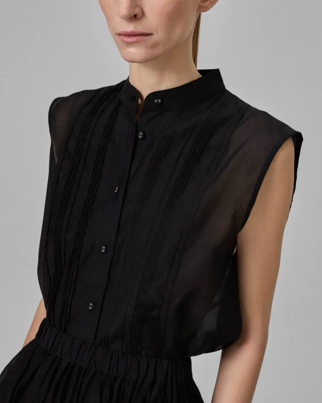 Sleeveless Tuxedo Shirt sold by TNT Fashion