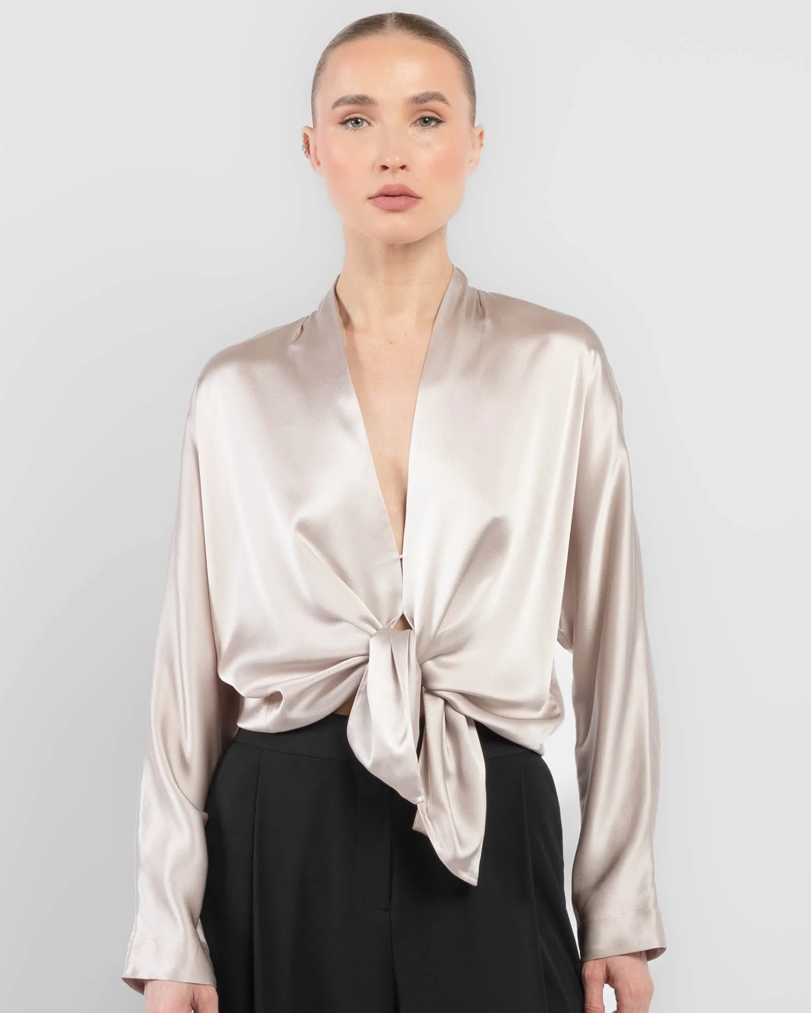Long Sleeve Tie Front Top sold by TNT Fashion