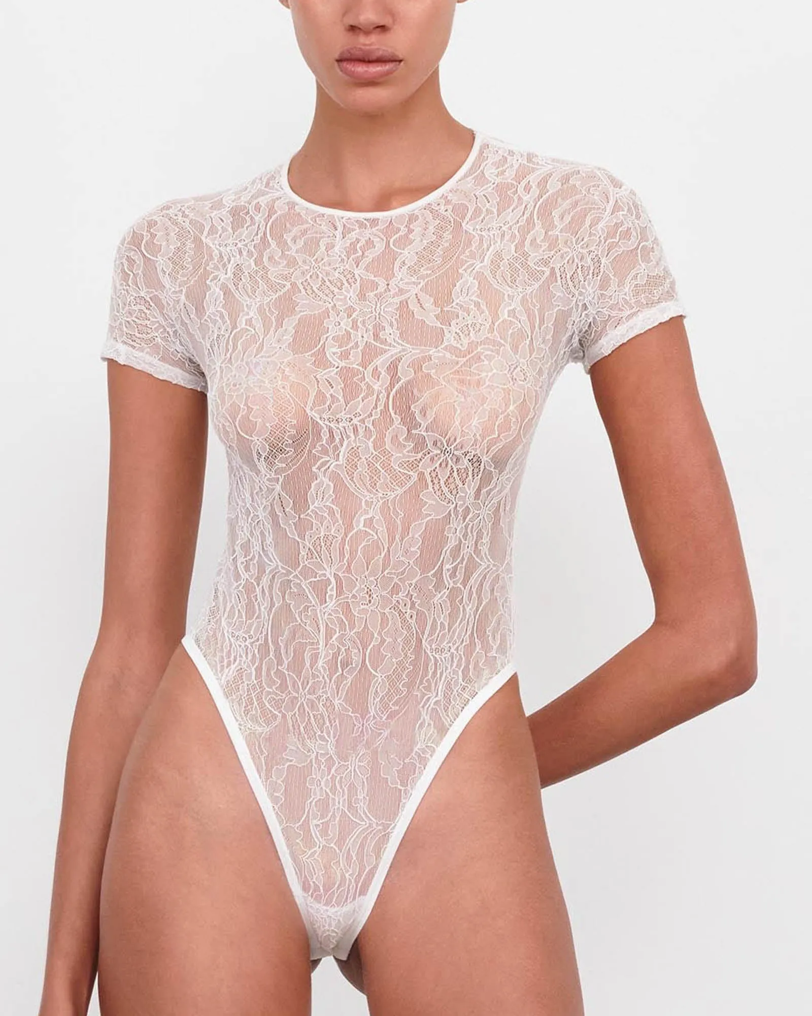 Lace Cap Sleeve Bodysuit sold by TNT Fashion
