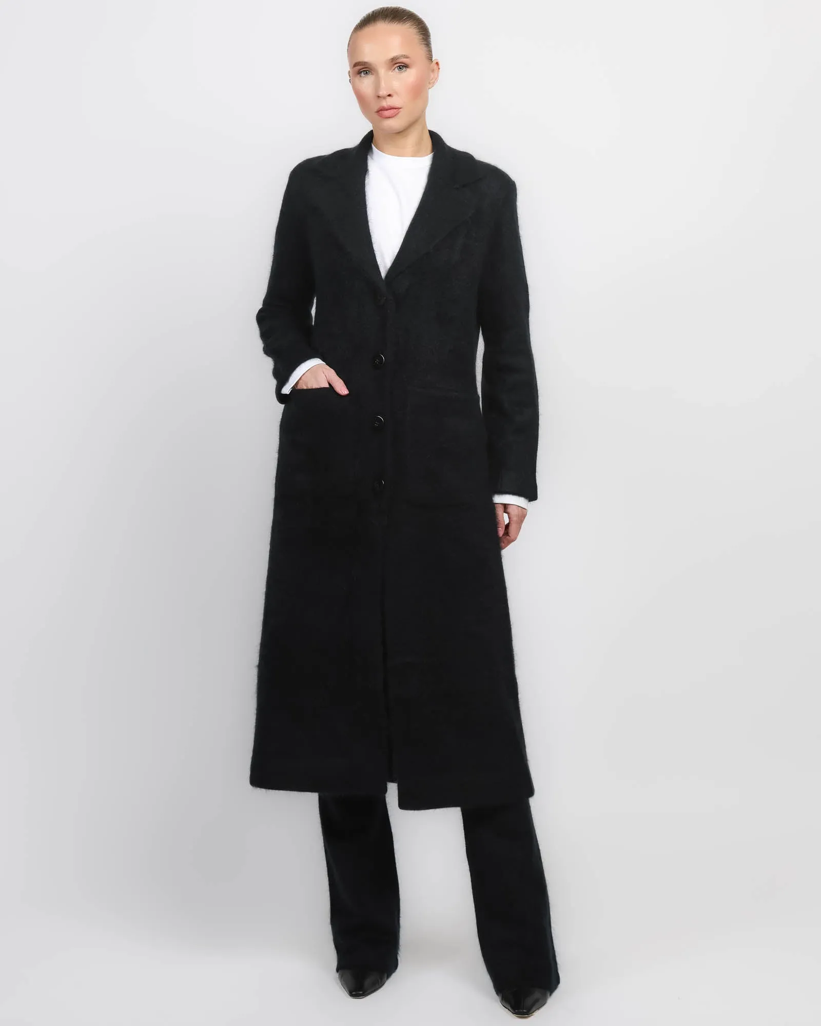 Fluffy Statement Coat sold by TNT Fashion