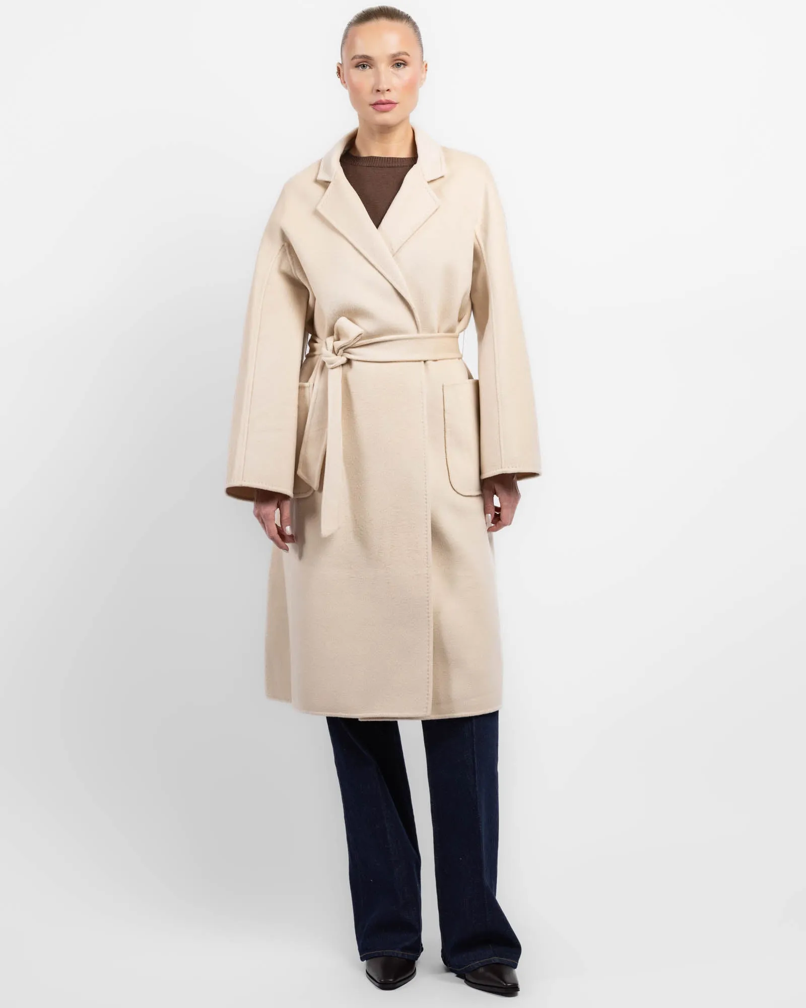 Coat sold by TNT Fashion