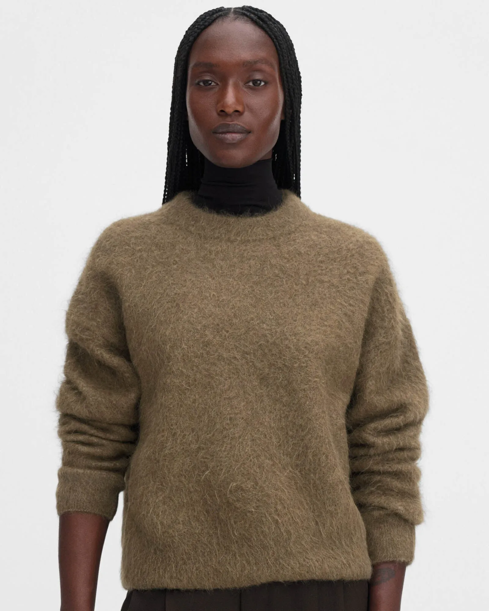 Fluffy Sweater sold by TNT Fashion