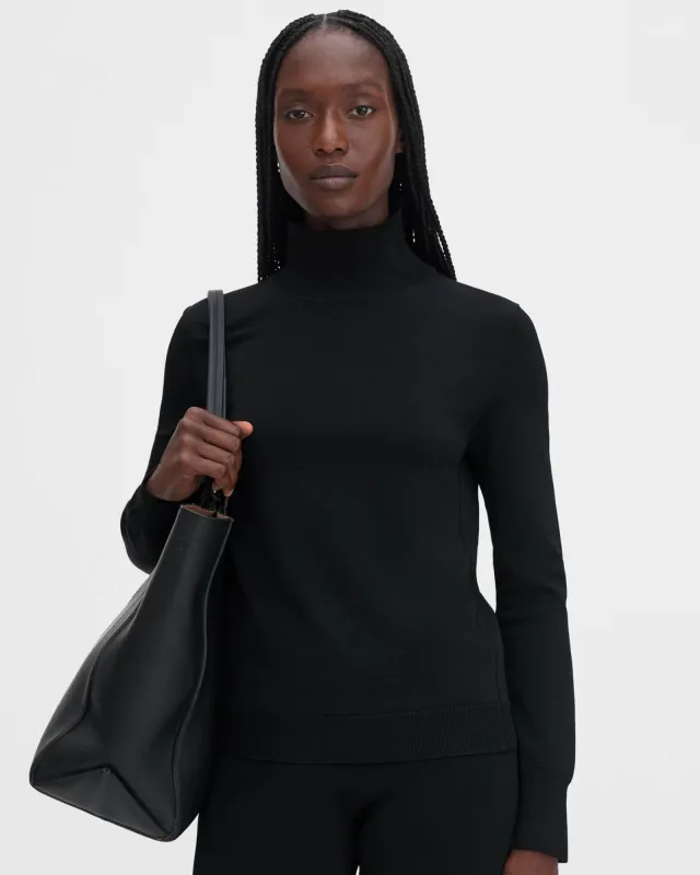 Glossy Turtleneck Sweater sold by TNT Fashion