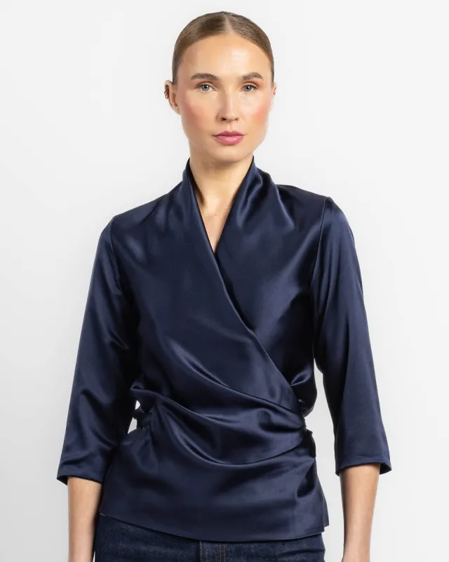 Three-Quarter Sleeve Wrap Top sold by TNT Fashion