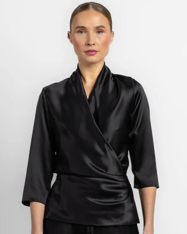 Three-Quarter Sleeve Wrap Top sold by TNT Fashion