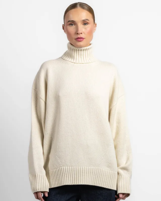 Oversized Luxe Turtleneck sold by TNT Fashion