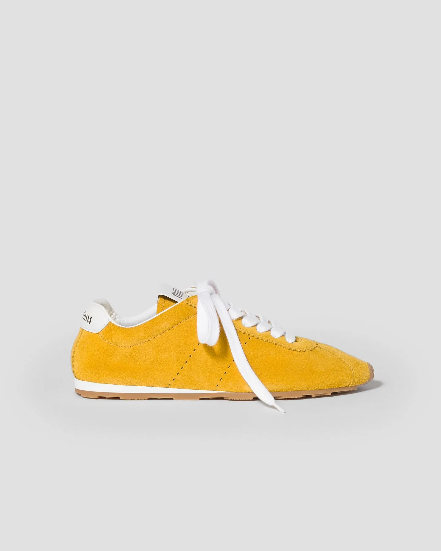 Plume Suede Sneaker sold by TNT Fashion