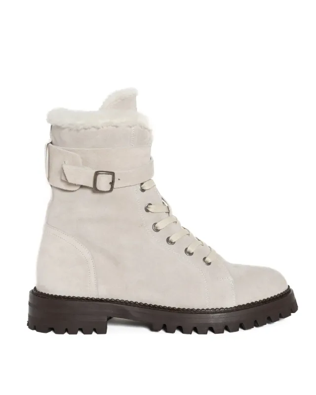 Boots sold by TNT Fashion