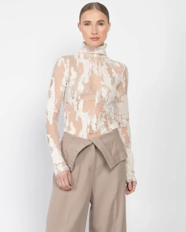 Sheer Print Turtleneck Blouse sold by TNT Fashion