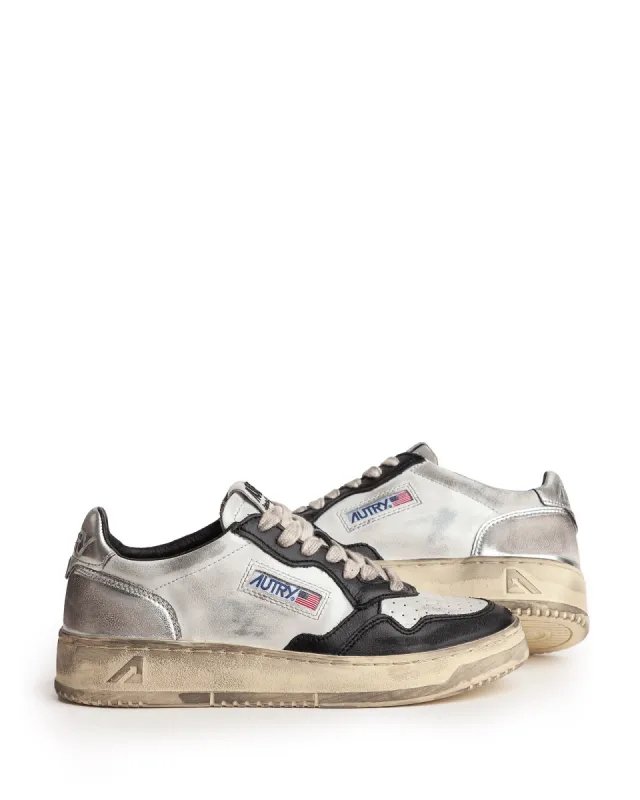Super Vintage Sneakers sold by TNT Fashion