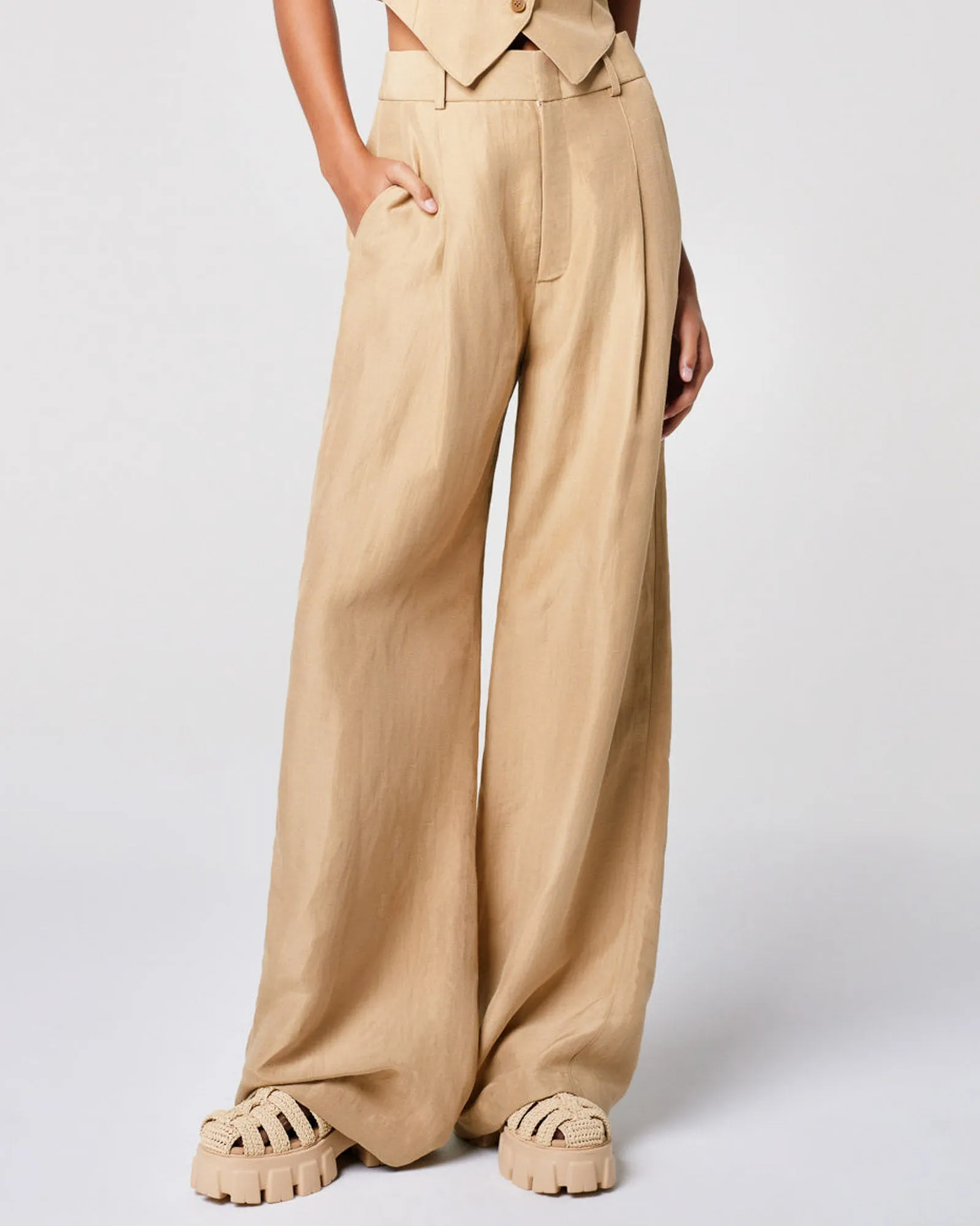 Pleated Trousers sold by TNT Fashion