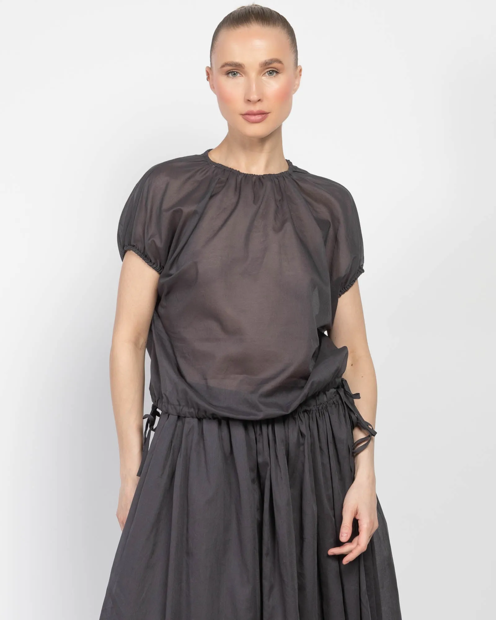 Sheer Vol. Top sold by TNT Fashion