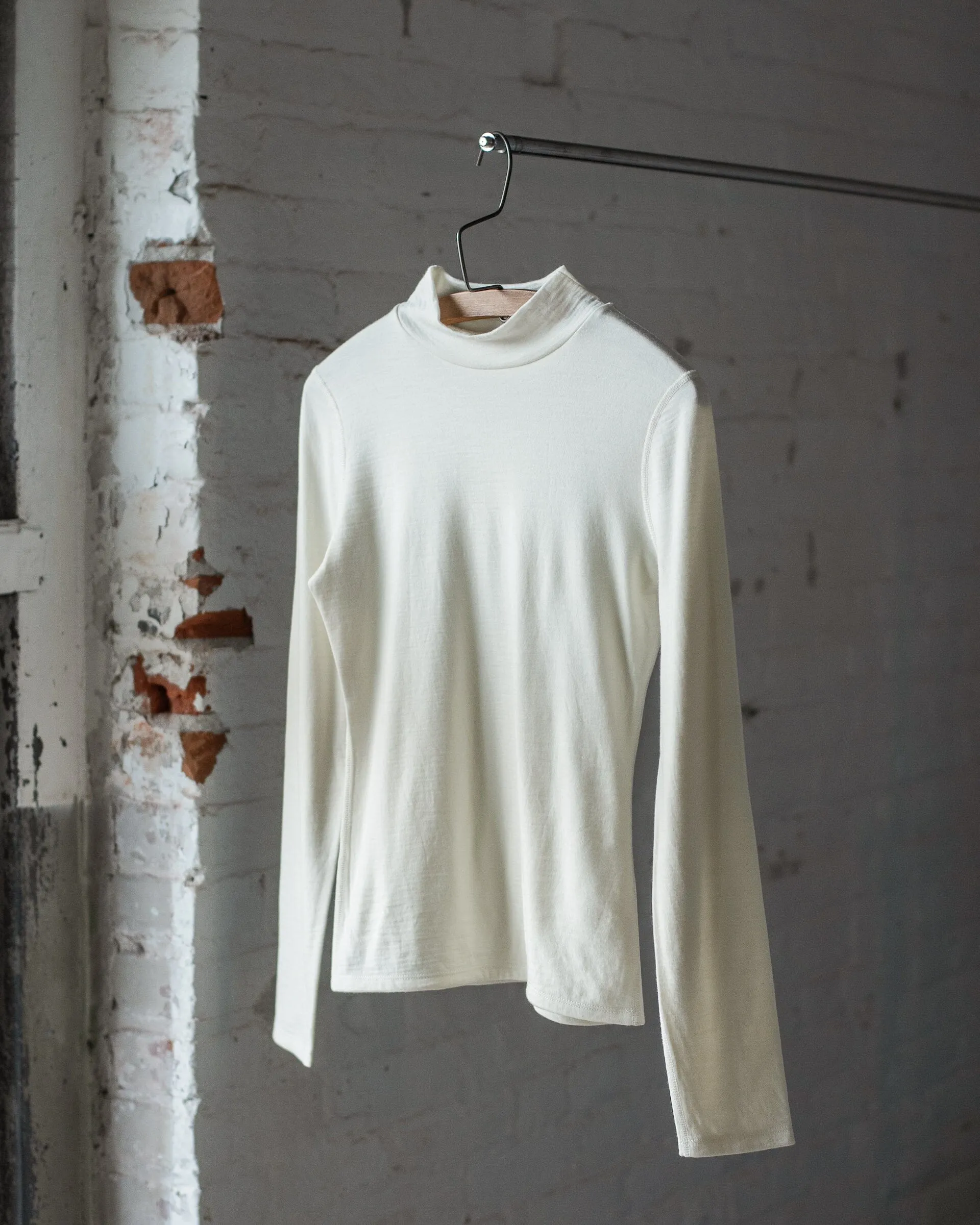 The 195 Merino Fitted Mockneck sold by Ecologyst