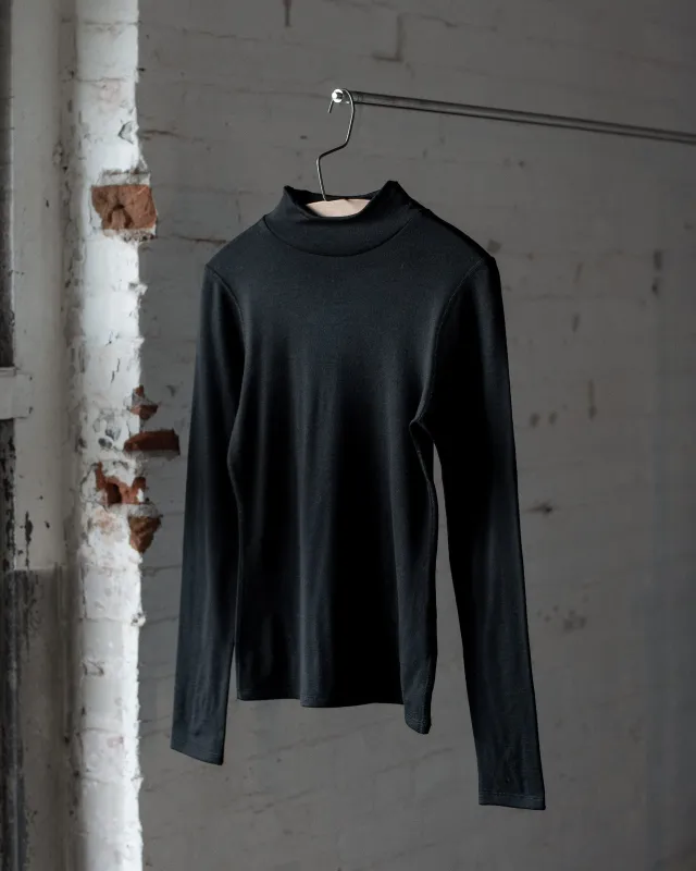 The 195 Merino Fitted Mockneck sold by Ecologyst