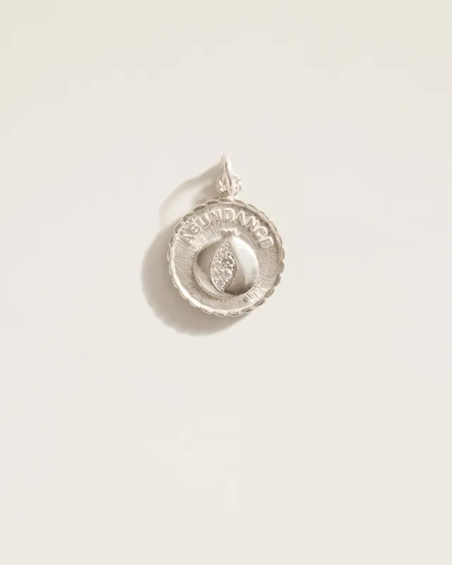 The Abundance Prayer Pendant in Sterling Silver sold by High Light Rituals