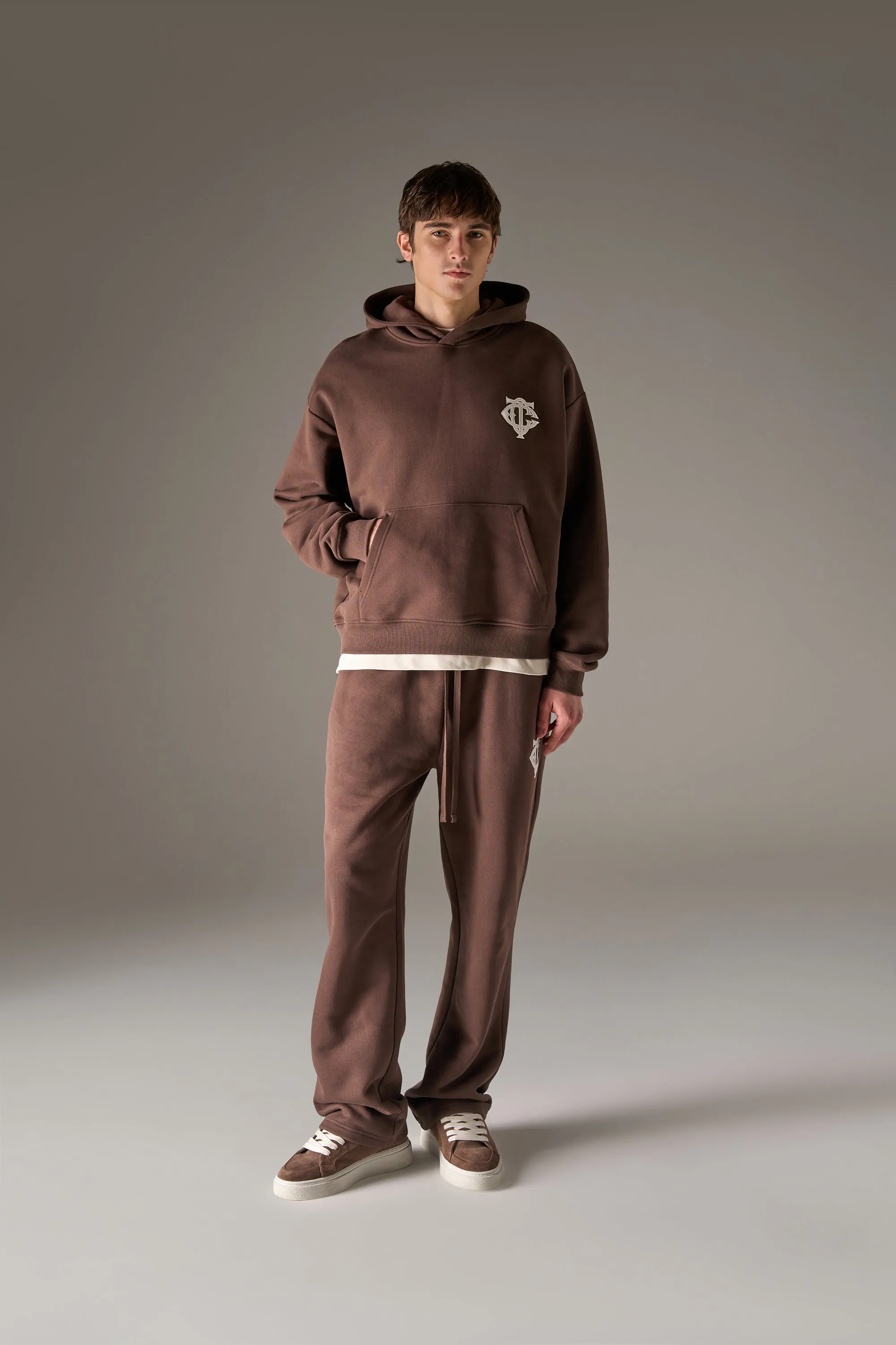 HEAVYWEIGHT MONOGRAM APPLIQUE EMBLEM JOGGERS - BROWN sold by The Couture Club product image thumbnail 3