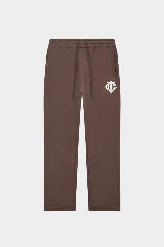 HEAVYWEIGHT MONOGRAM APPLIQUE EMBLEM JOGGERS - BROWN sold by The Couture Club