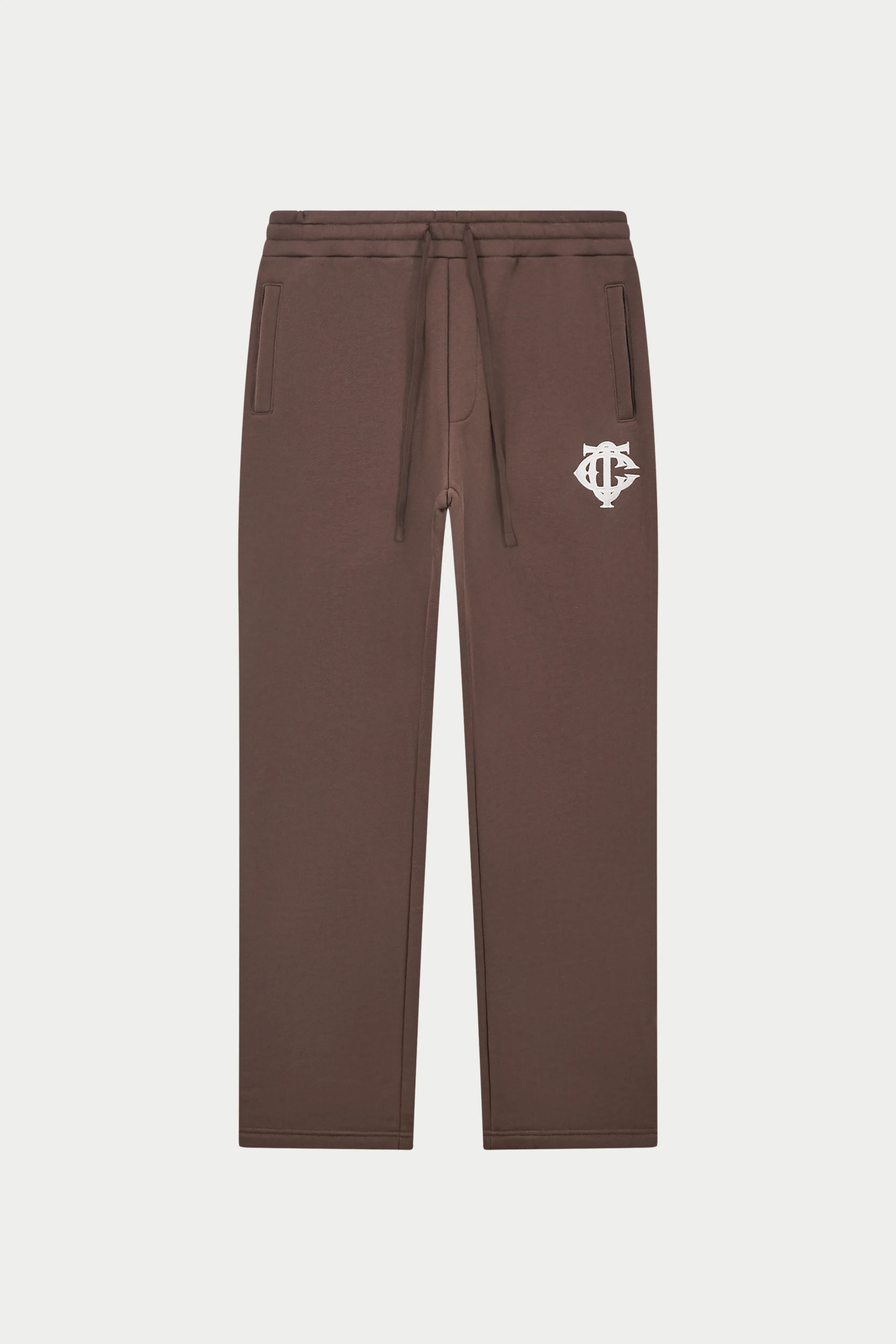 HEAVYWEIGHT MONOGRAM APPLIQUE EMBLEM JOGGERS - BROWN sold by The Couture Club