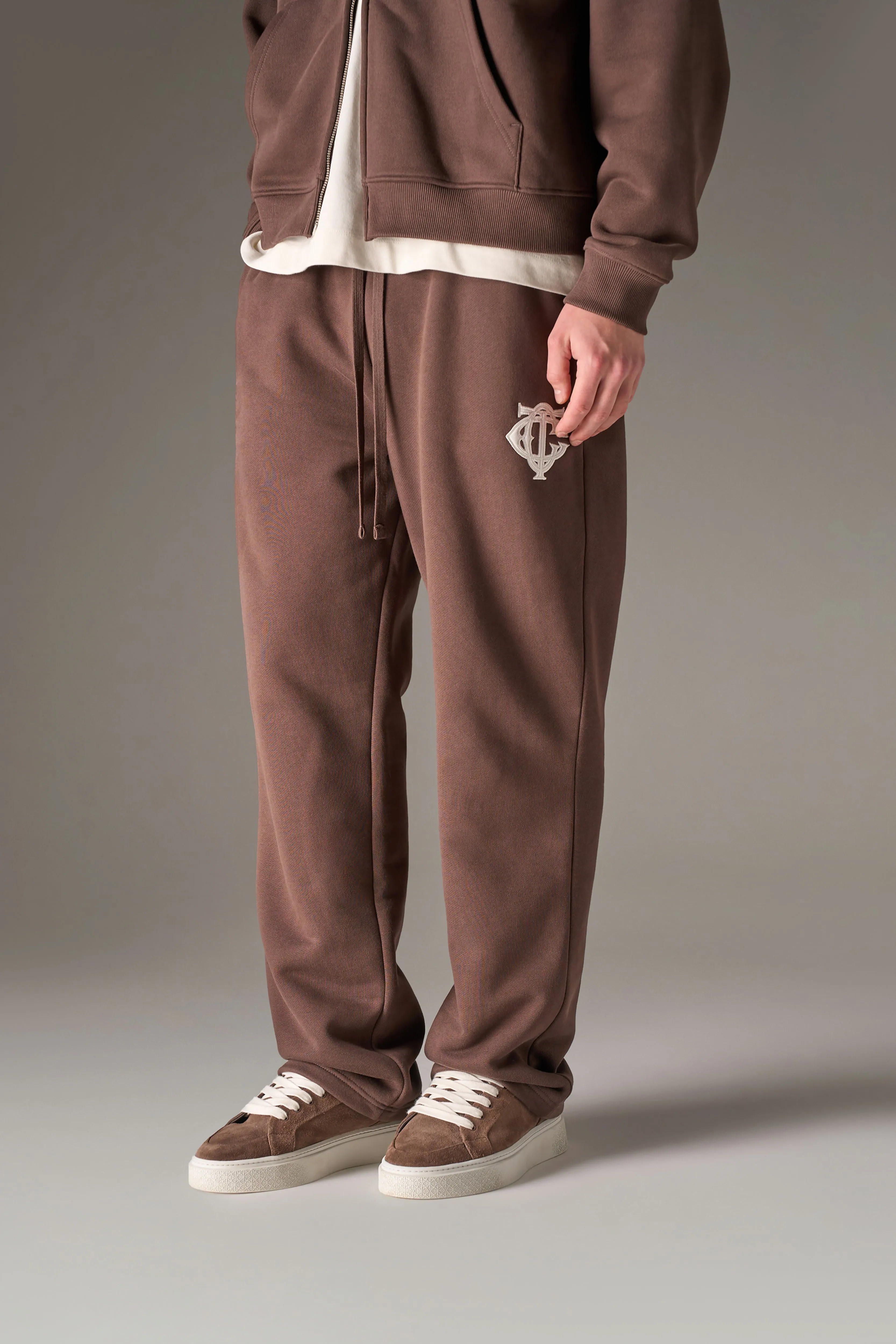 HEAVYWEIGHT MONOGRAM APPLIQUE EMBLEM JOGGERS - BROWN sold by The Couture Club product image thumbnail 2