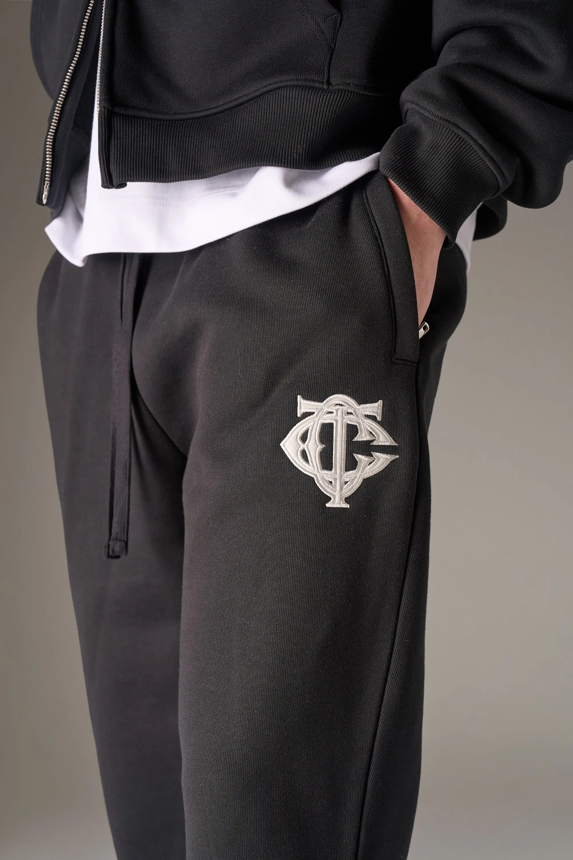 HEAVYWEIGHT MONOGRAM APPLIQUE EMBLEM JOGGERS - BLACK sold by The Couture Club product image thumbnail 5
