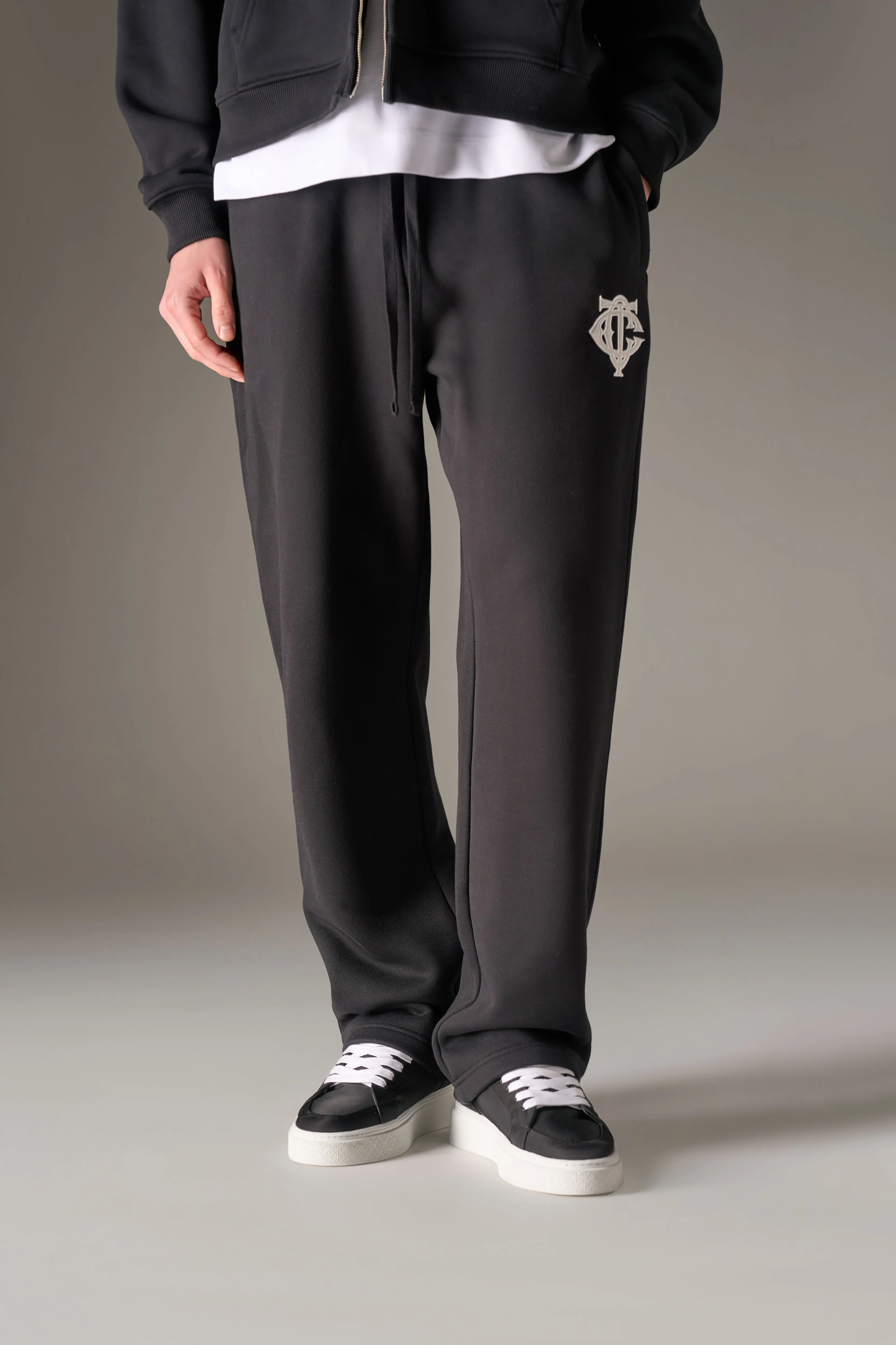 HEAVYWEIGHT MONOGRAM APPLIQUE EMBLEM JOGGERS - BLACK sold by The Couture Club product image thumbnail 4