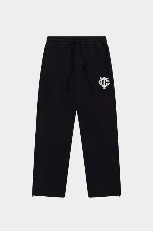 HEAVYWEIGHT MONOGRAM APPLIQUE EMBLEM JOGGERS - BLACK sold by The Couture Club