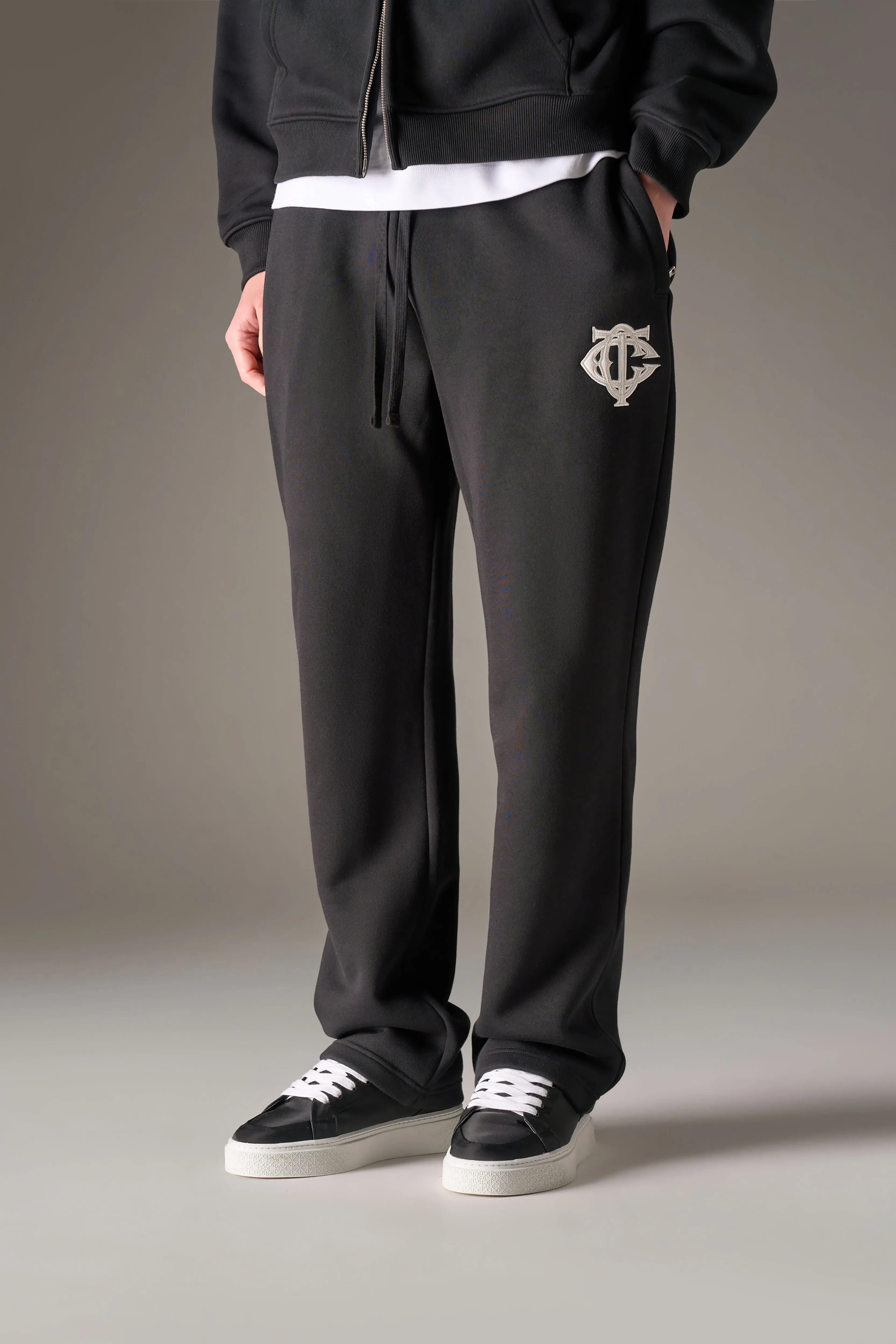 HEAVYWEIGHT MONOGRAM APPLIQUE EMBLEM JOGGERS - BLACK sold by The Couture Club product image thumbnail 2