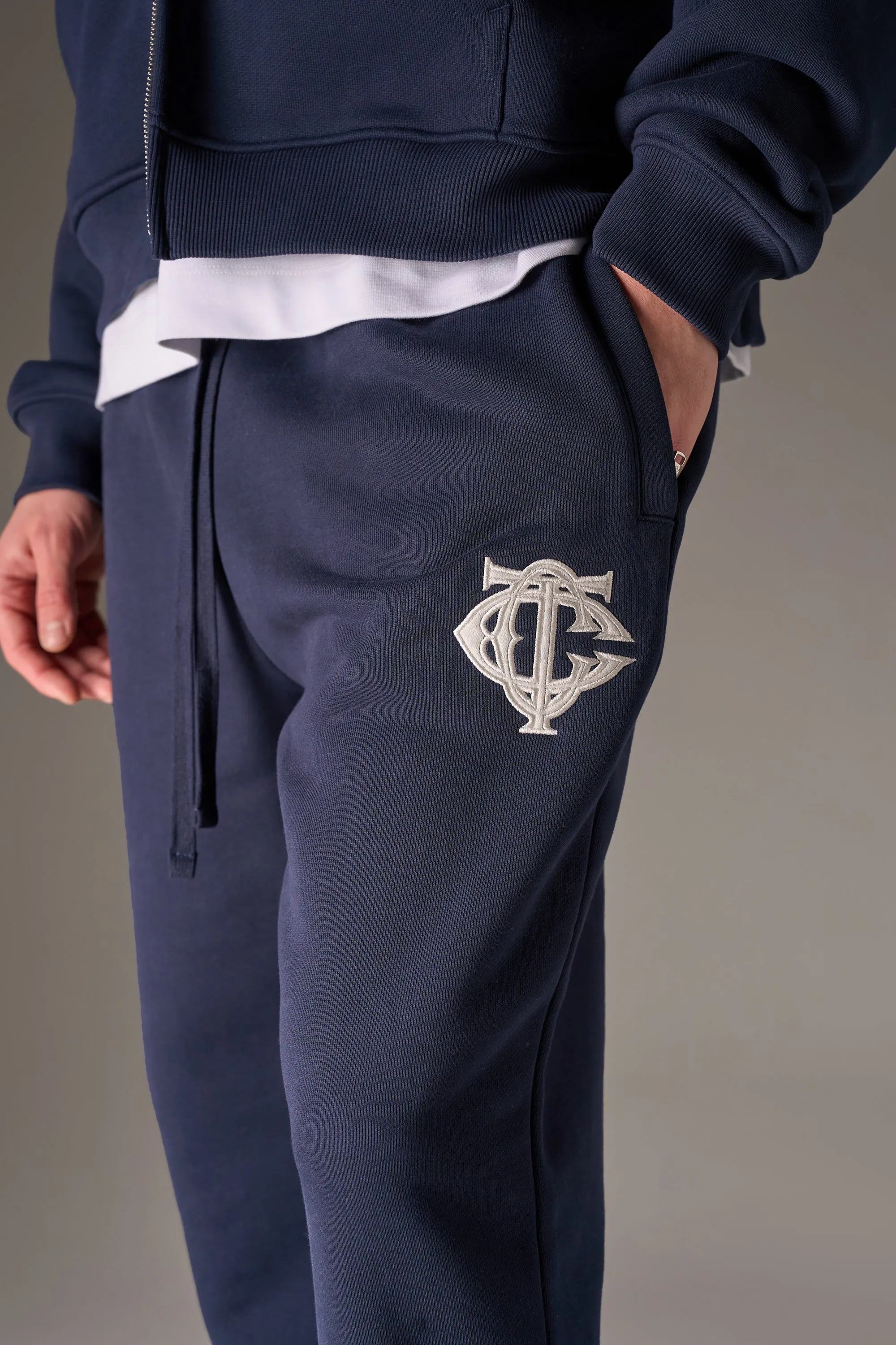 HEAVYWEIGHT MONOGRAM APPLIQUE EMBLEM JOGGERS - NAVY sold by The Couture Club product image thumbnail 5