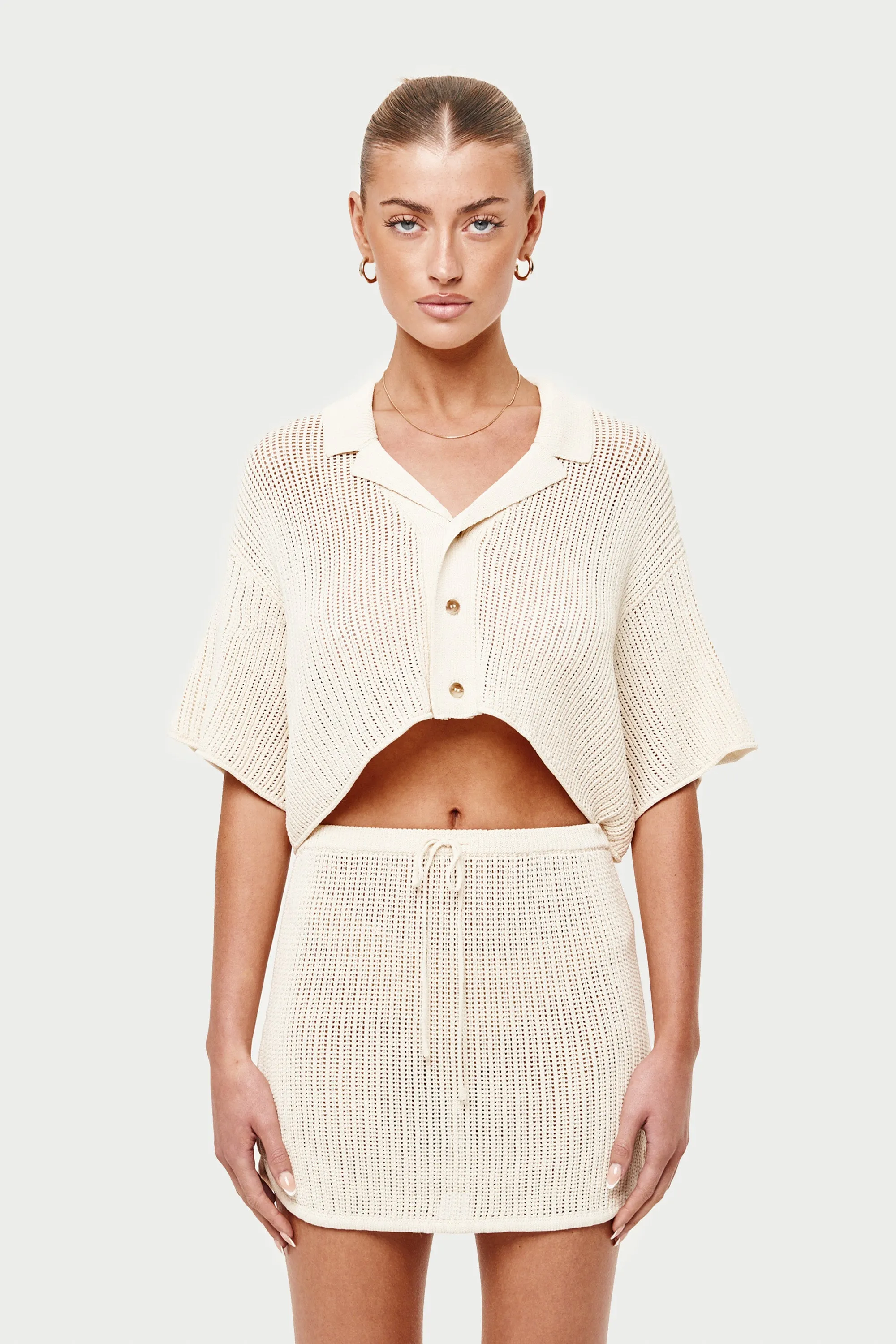 KNITTED CROPPED RESORT SHIRT - OFF WHITE sold by The Couture Club