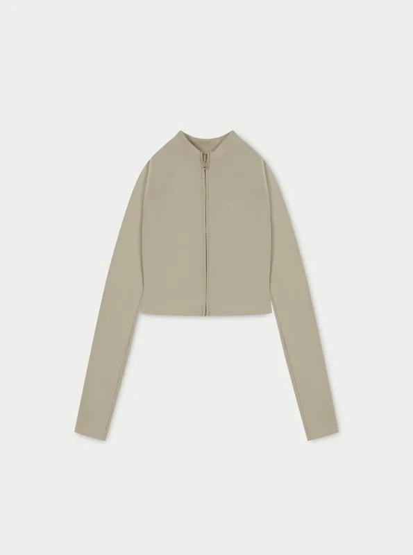 SCULPTING EMBLEM ZIP THROUGH TOP - BEIGE sold by The Couture Club