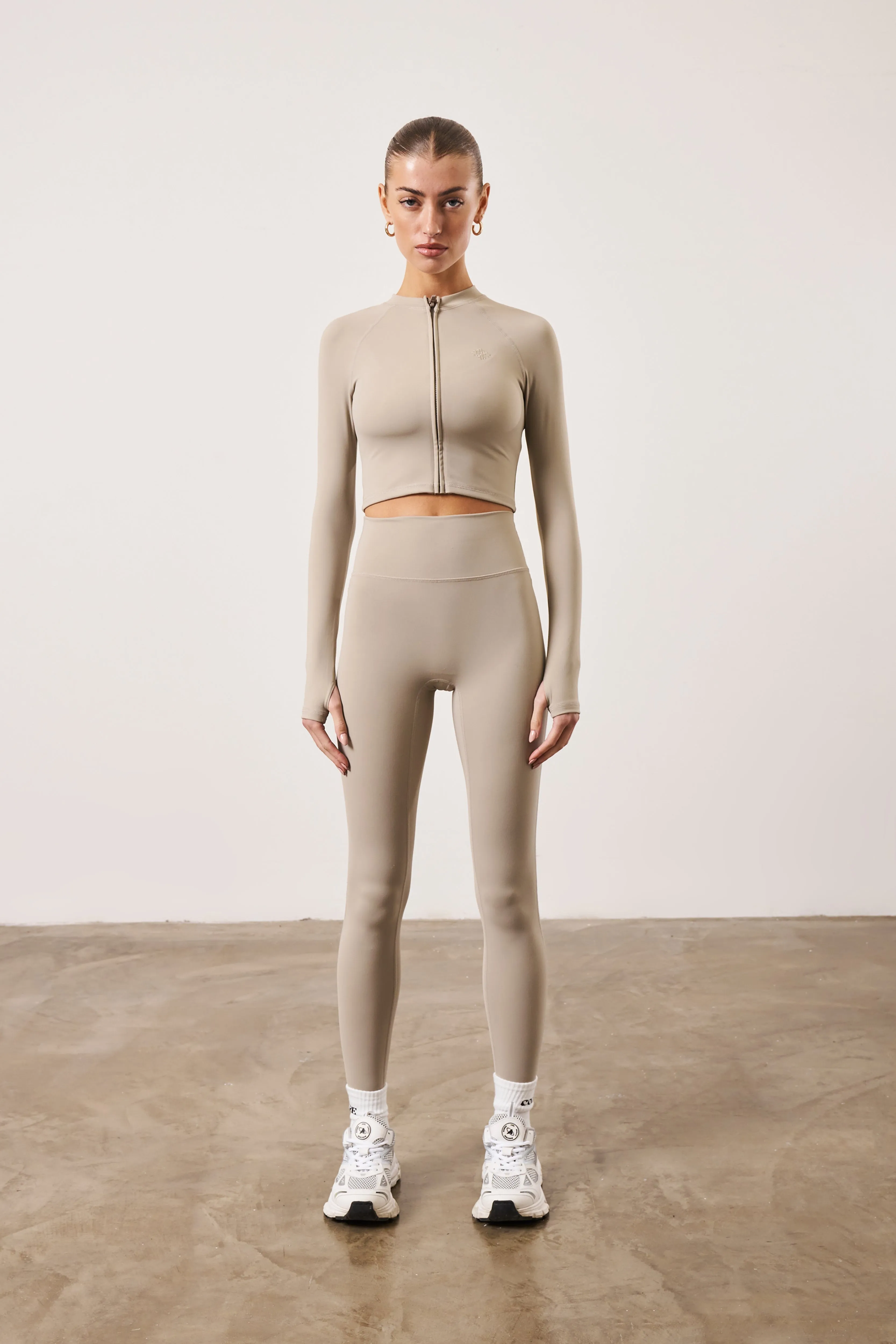 SCULPTING EMBLEM ZIP THROUGH TOP - BEIGE sold by The Couture Club product image thumbnail 3