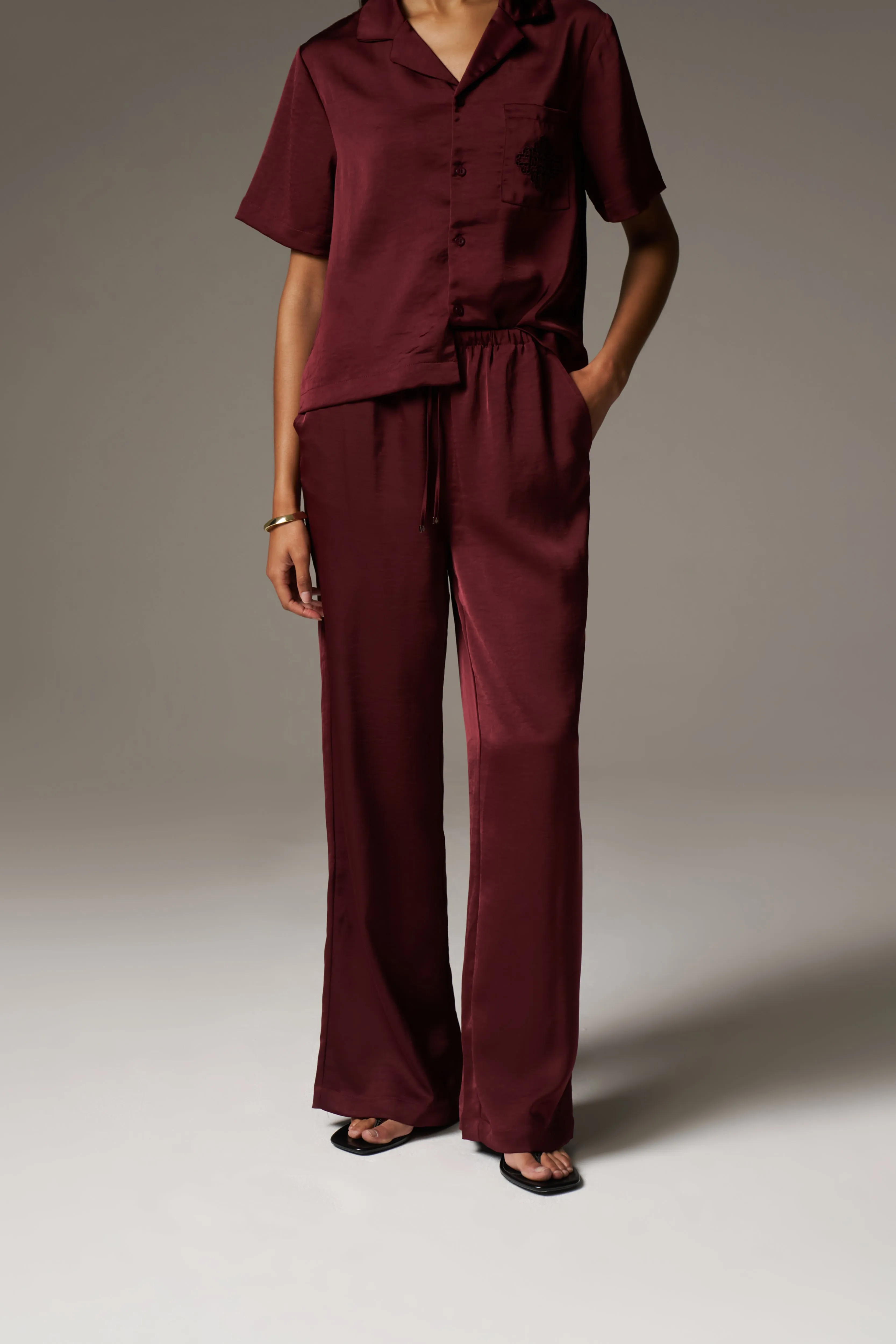 SATIN WIDE LEG EMBLEM TROUSERS - BURGUNDY sold by The Couture Club product image thumbnail 4