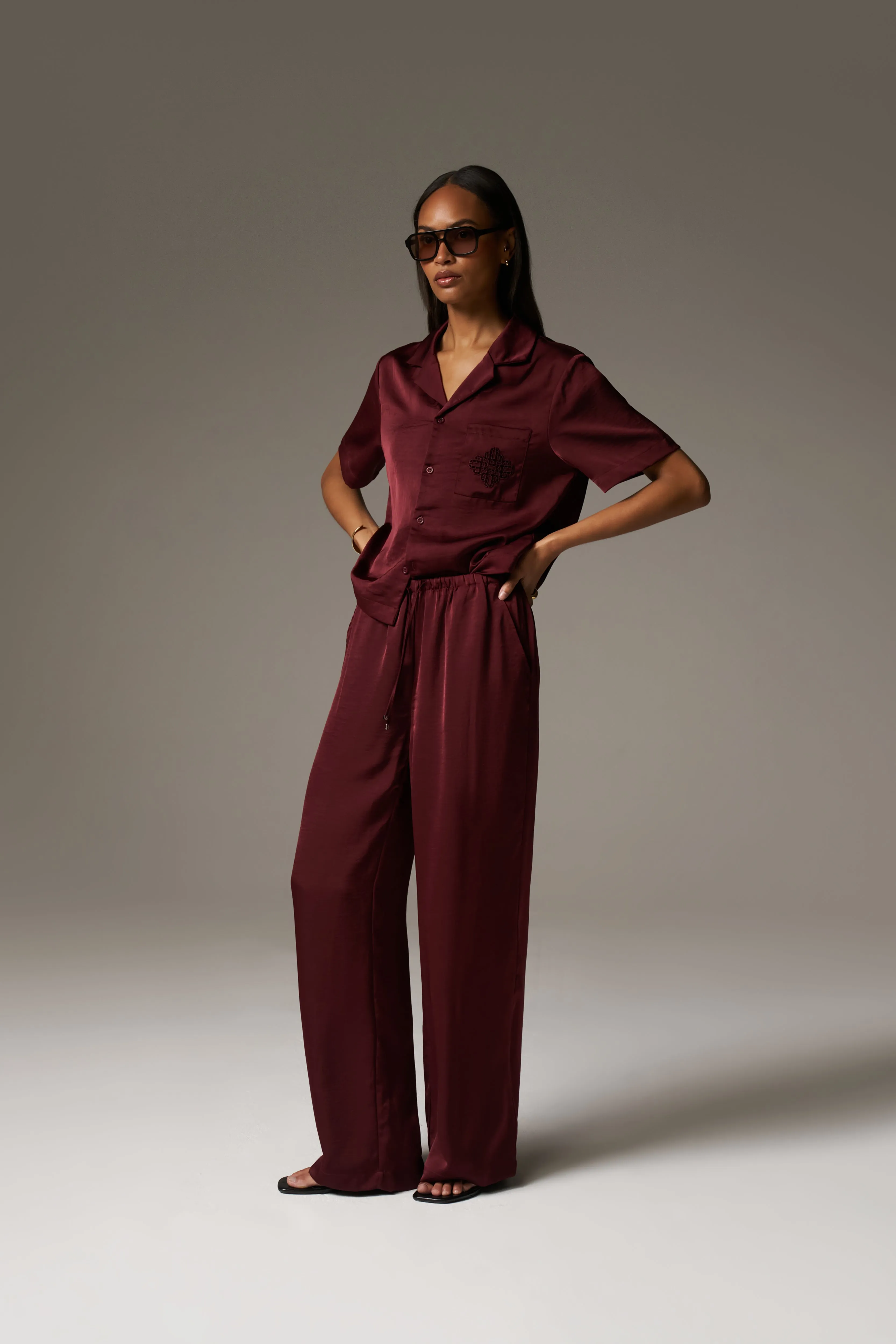 SATIN WIDE LEG EMBLEM TROUSERS - BURGUNDY sold by The Couture Club product image thumbnail 5