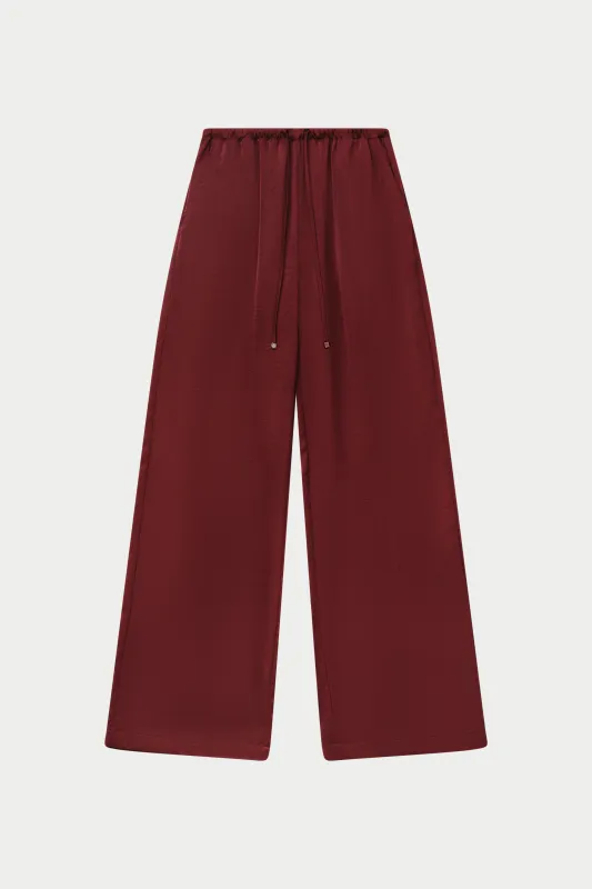 SATIN WIDE LEG EMBLEM TROUSERS - BURGUNDY sold by The Couture Club