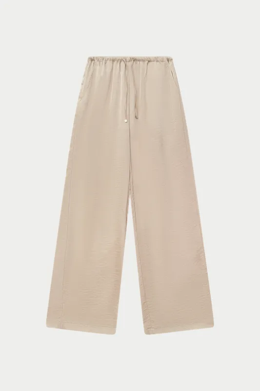 SATIN WIDE LEG EMBLEM TROUSERS - BEIGE sold by The Couture Club
