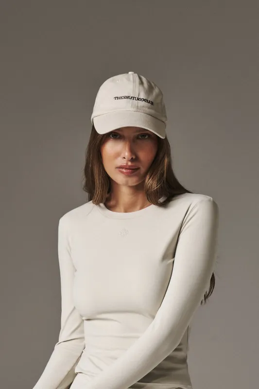 WASHED REVERSE COPYRIGHT CAP - OFF WHITE made by The Couture Club