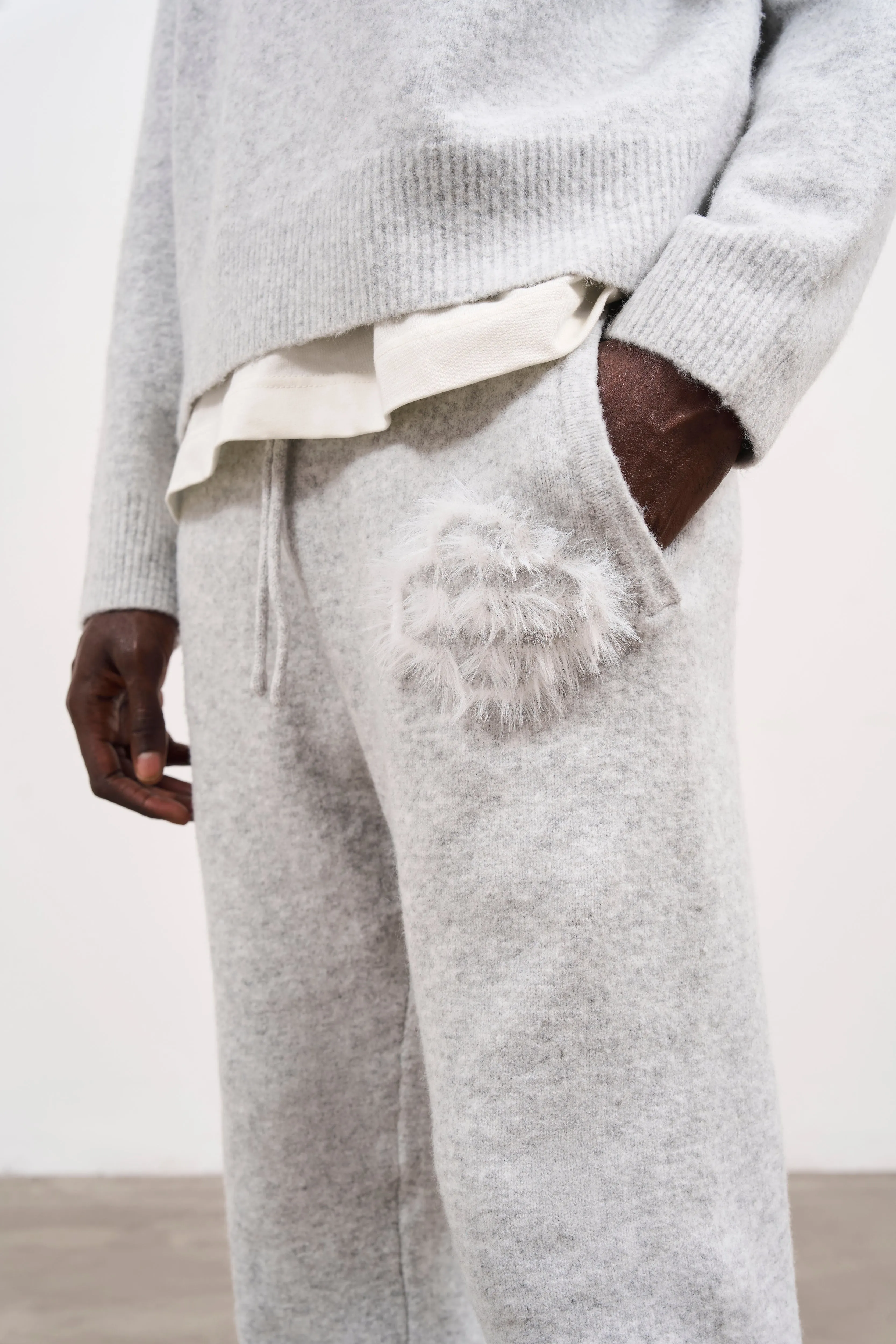 FLUFFY EMBLEM KNITTED JOGGERS - GREY MARL sold by The Couture Club product image thumbnail 4
